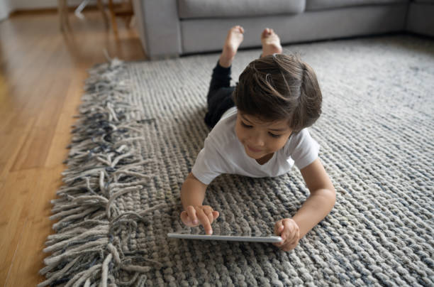 Girl lying on rug | Hadinger Flooring