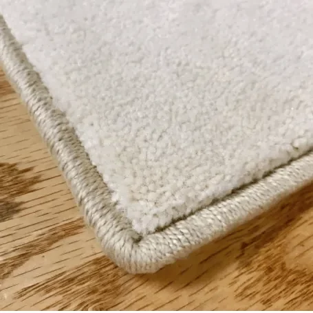 Machine-Serging-circle Custom Rugs | Hadinger Flooring